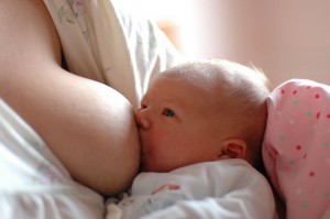 1024px-Breastfeeding_a_baby-300x199